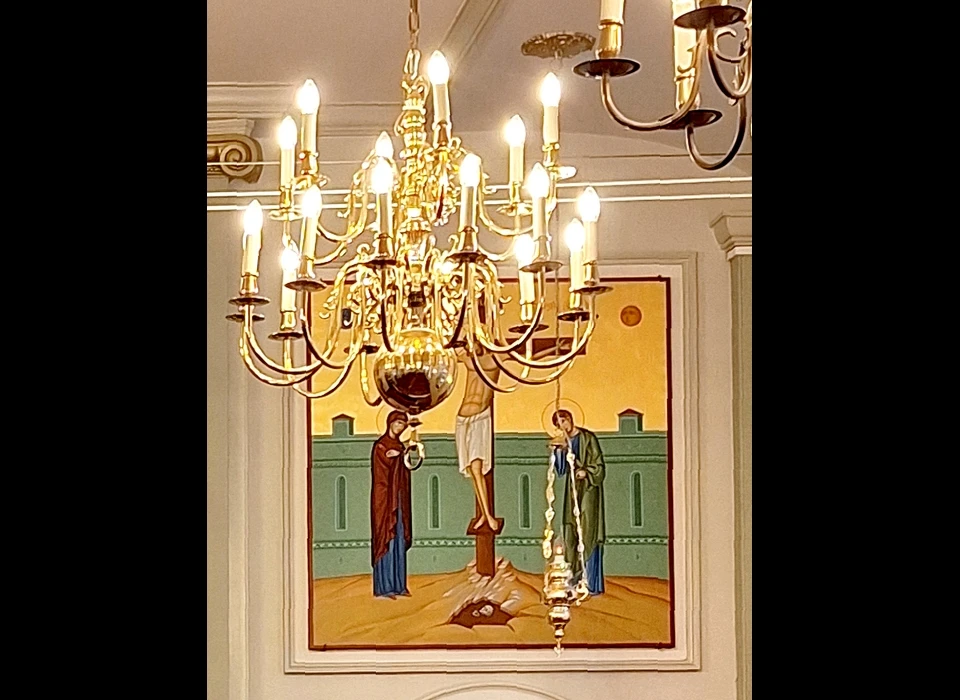 Krom Boomssloot 22 afbeelding van kruisiging van Jezus, de voeten zijn niet gekruisd met als betekenis de overwinning op de dood (Wederopstanding) (2025)