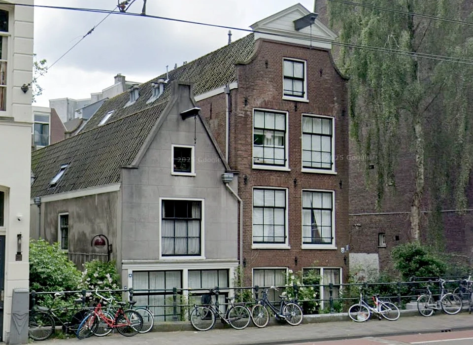 Marnixstraat 291-295 de huizen staan op een lager niveau (2025)